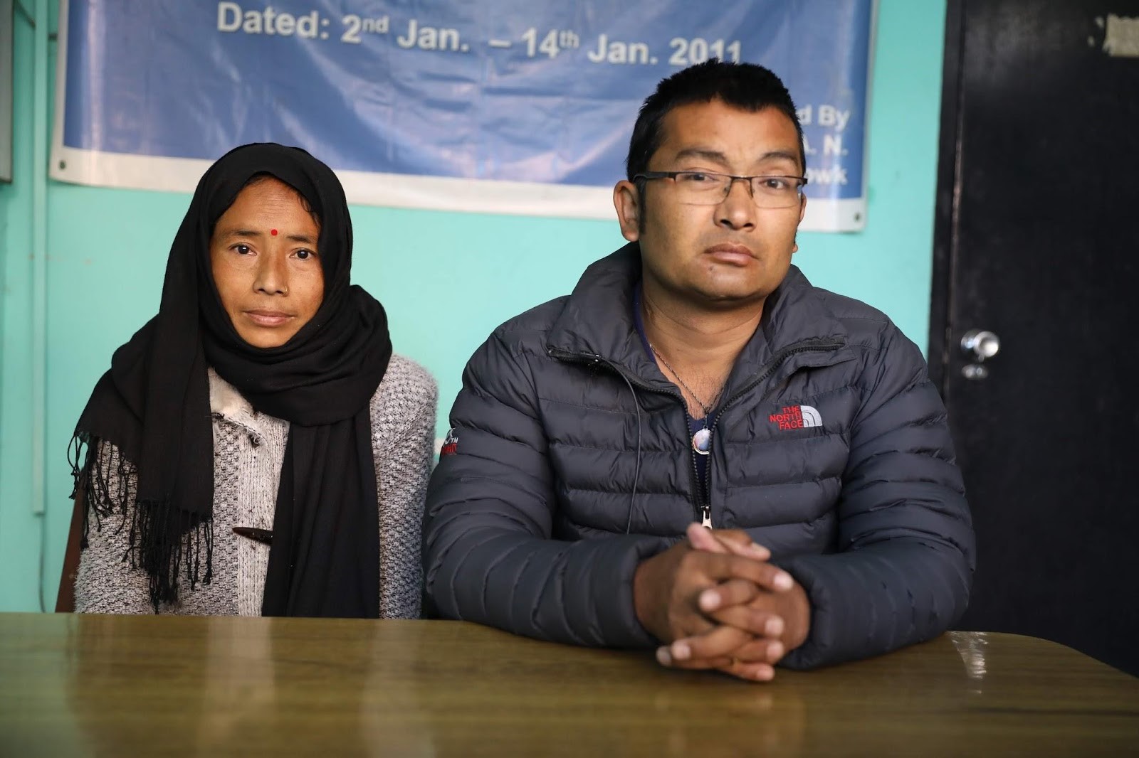 Alisha and Bibek awaiting an appointment at a clinic in Nepal.