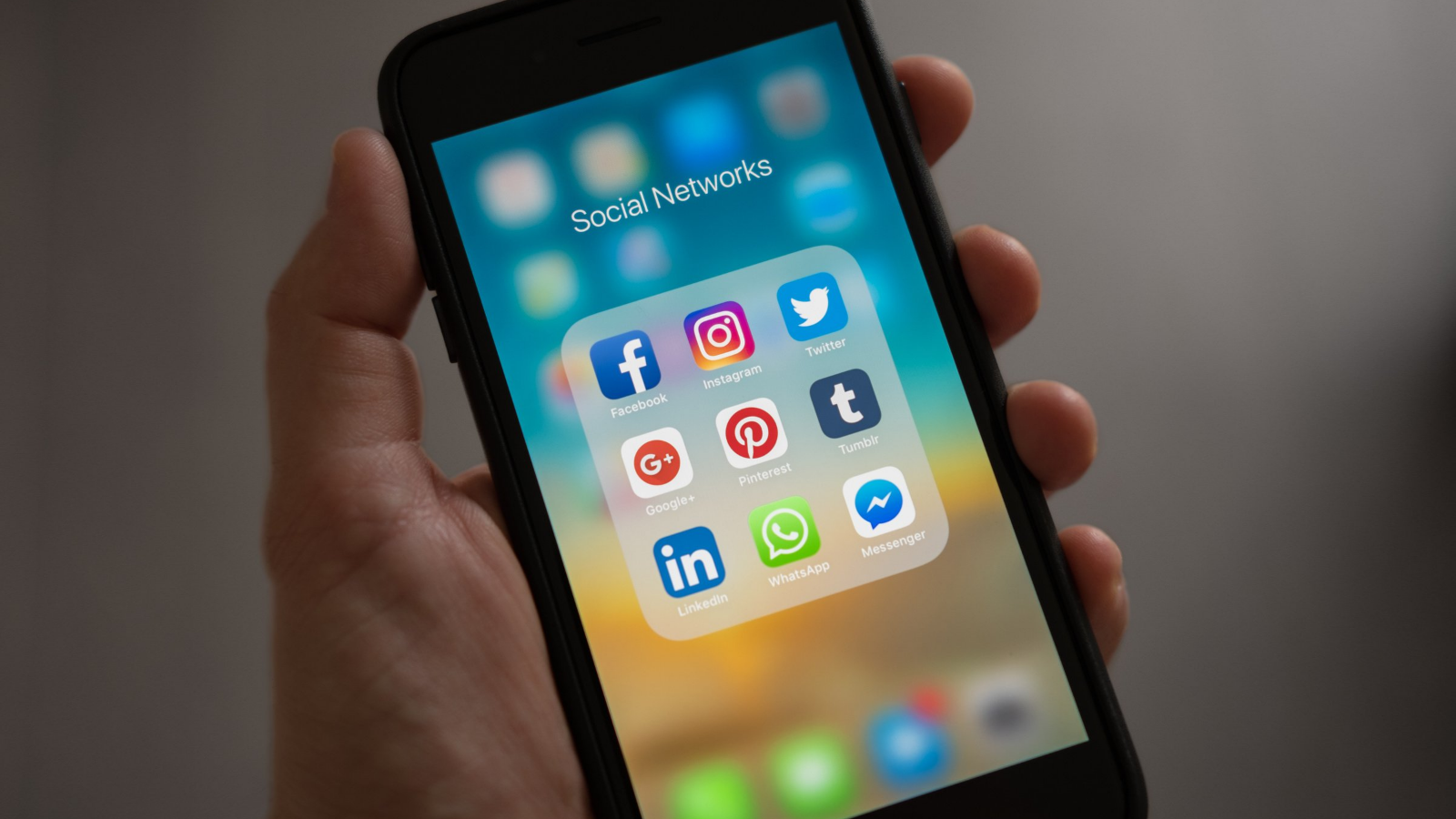 mobile phone displaying social media icons